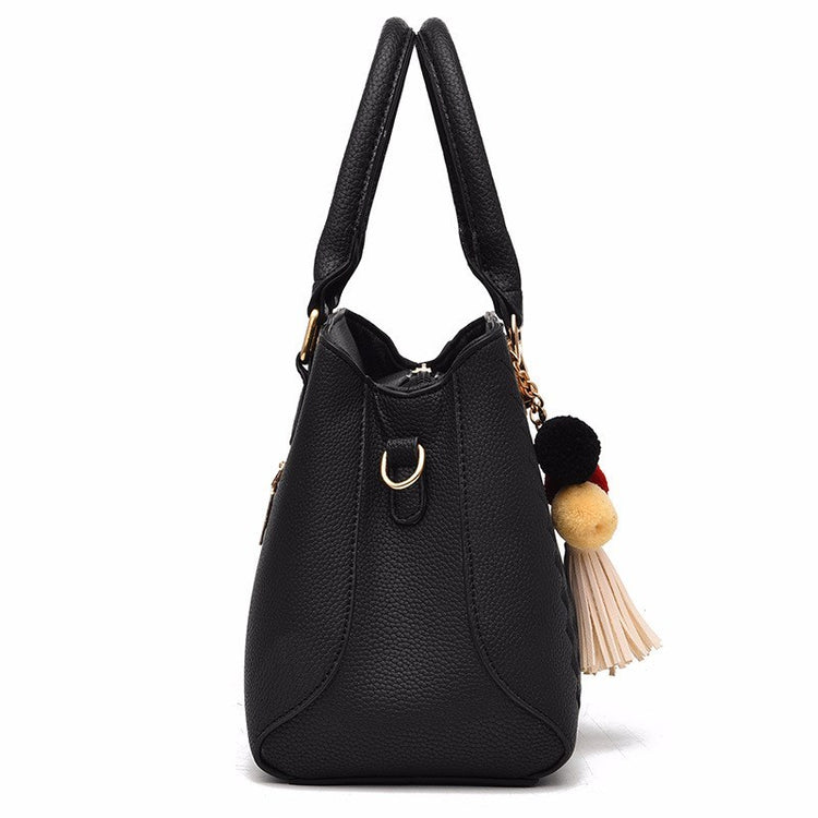 Elegant ladies leather handbag on white background