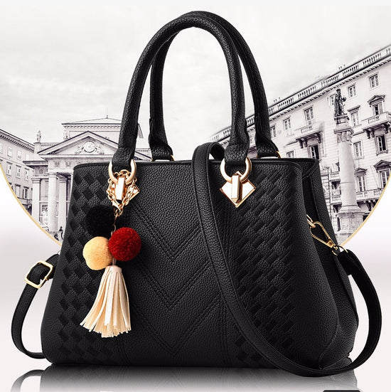 Black luxury women’s crossbody handbag with gold hardware
